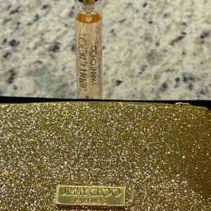 Jimmy Choo Glittering Gold Zip Pouch with I want Choo parfum.  NEW